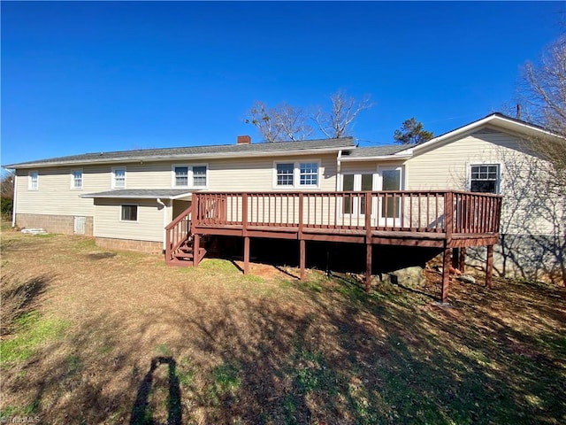 rear view of house with a deck