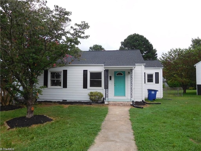 3121 Luther St, Winston-Salem, NC 27127 - view of front facade with a front yard and a shingled roof