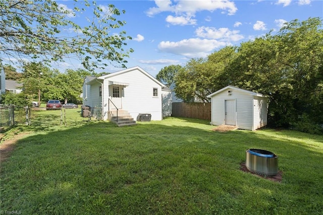 3121 Luther St, Winston-Salem, NC 27127 - back of house featuring a storage shed and a gate