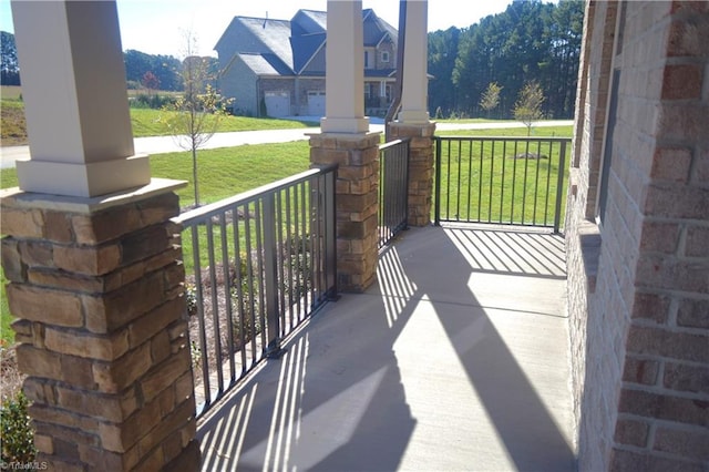 view of patio featuring a porch