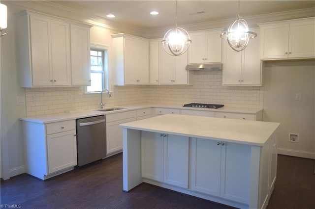 kitchen featuring dishwasher, a center island, white cabinets, hanging light fixtures, and dark hardwood / wood-style flooring