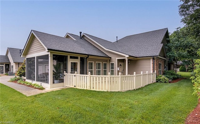 2429 Waterwheel Dr, Winston-Salem, NC 27103 - back of house with roof with shingles and a sunroom