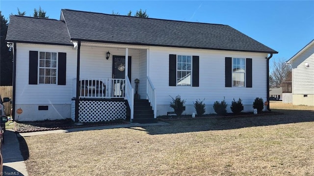 view of front of property with crawl space, covered porch, and roof with shingles