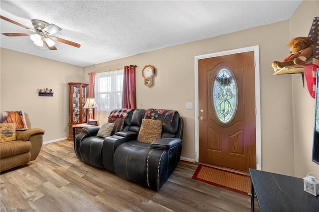 214 Stokes Forest Dr, King, NC 27021 - entryway with ceiling fan, wood finished floors, and a textured ceiling