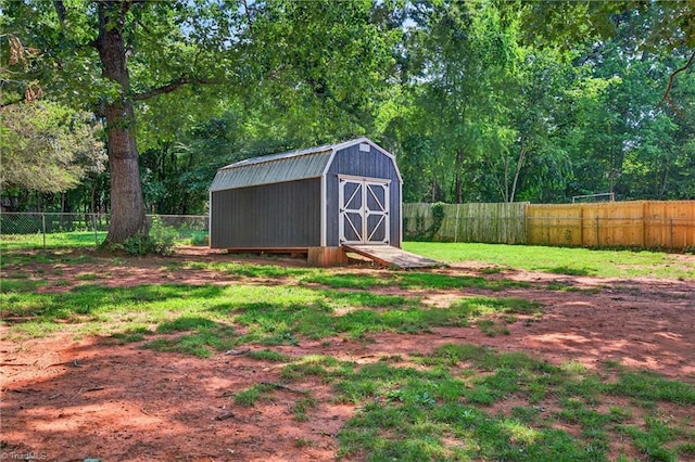 214 Stokes Forest Dr, King, NC 27021 - fenced backyard with a shed
