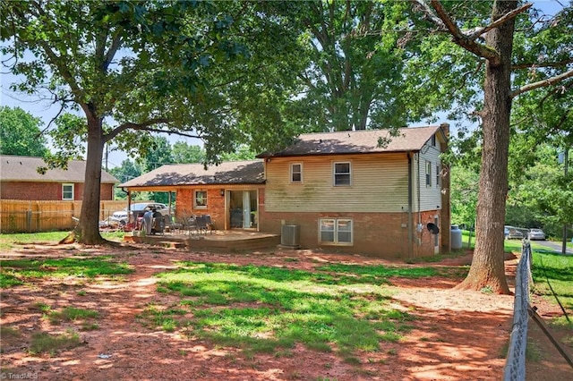 214 Stokes Forest Dr, King, NC 27021 - back of property featuring brick siding, french doors, and a deck