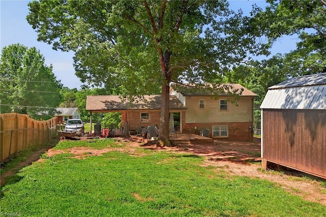 214 Stokes Forest Dr, King, NC 27021 - rear view of house featuring a shed and a deck