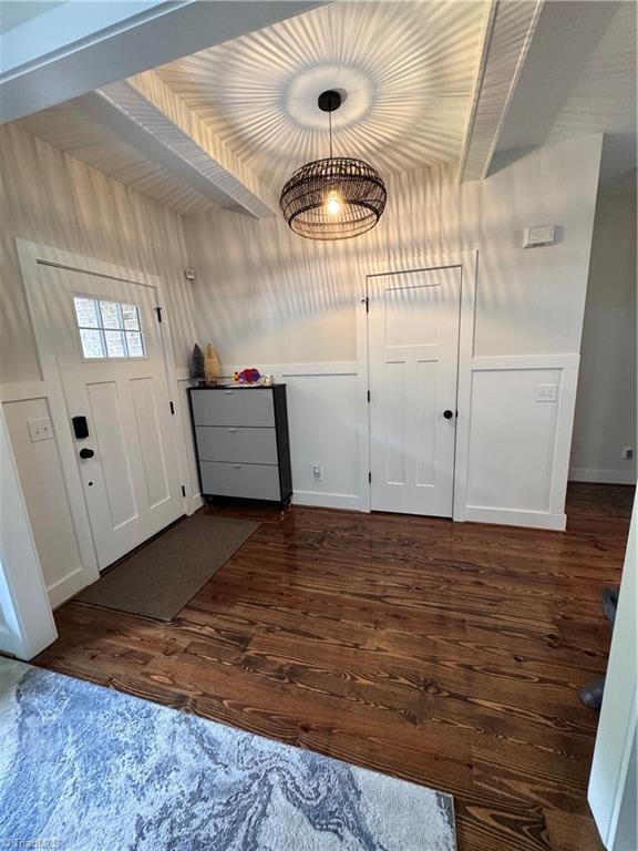 3064 Wesley Farm Ln, Sophia, NC 27350 - entrance foyer featuring dark wood-style floors and baseboards