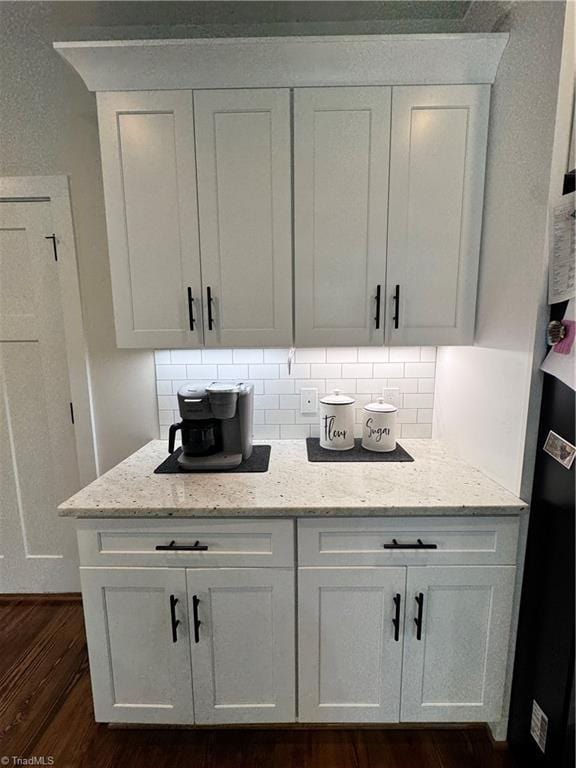 3064 Wesley Farm Ln, Sophia, NC 27350 - bar featuring tasteful backsplash and dark wood-type flooring