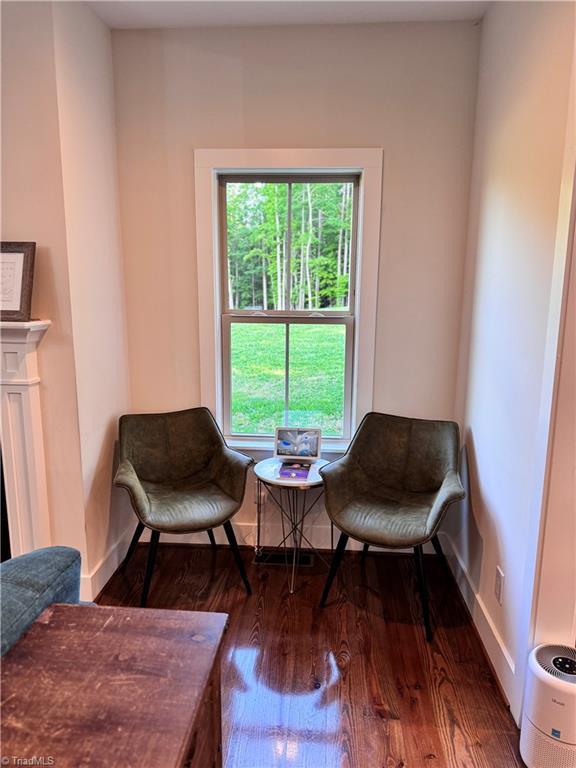 3064 Wesley Farm Ln, Sophia, NC 27350 - sitting room with wood finished floors and baseboards