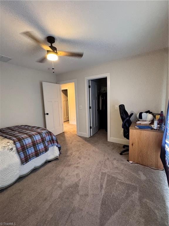 3064 Wesley Farm Ln, Sophia, NC 27350 - carpeted bedroom featuring baseboards, a ceiling fan, and a desk