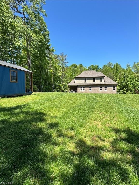 3064 Wesley Farm Ln, Sophia, NC 27350 - view of green lawn with an outdoor structure