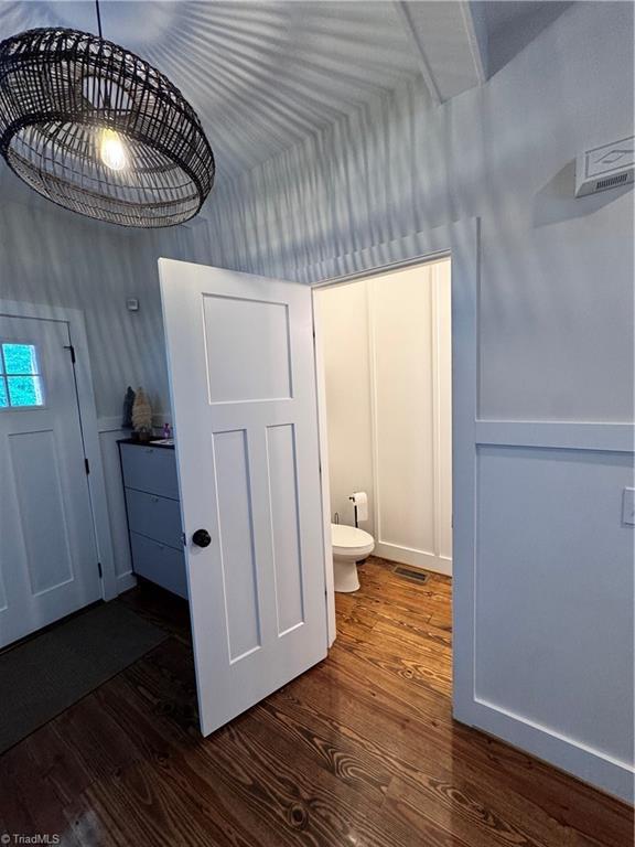 3064 Wesley Farm Ln, Sophia, NC 27350 - bathroom featuring wood finished floors and toilet