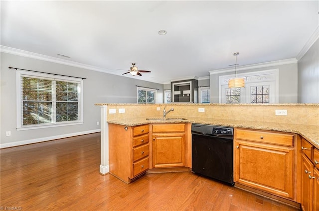 kitchen with sink, dishwasher, ornamental molding, hanging light fixtures, and light stone countertops