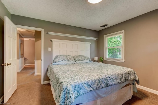 1274 Candlewood Dr, Elon, NC 27244 - bedroom featuring carpet floors, baseboards, a textured ceiling, and a closet