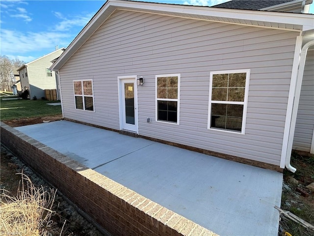 back of house featuring a patio area