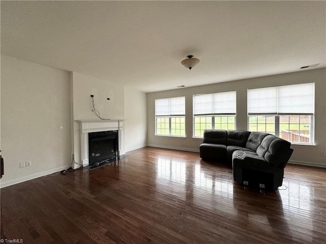 living room featuring dark wood-type flooring