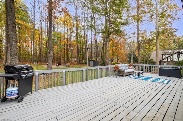 wooden deck with an outdoor living space