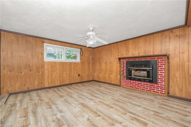 1788 Joshie Dr, Winston-Salem, NC 27103 - unfurnished living room with a ceiling fan, wood finished floors, wooden walls, baseboards, and ornamental molding