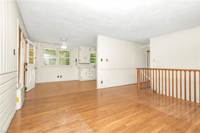 1788 Joshie Dr, Winston-Salem, NC 27103 - spare room with light wood-style flooring, ceiling fan, and a textured ceiling