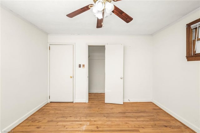 1788 Joshie Dr, Winston-Salem, NC 27103 - unfurnished bedroom featuring light wood-style floors, ornamental molding, baseboards, ceiling fan, and a closet