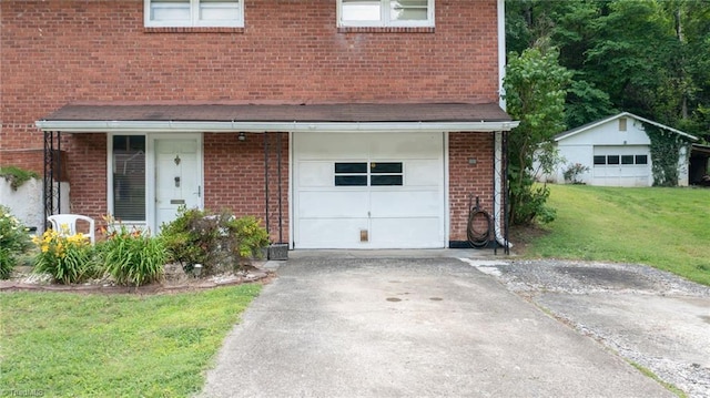 1788 Joshie Dr, Winston-Salem, NC 27103 - multi unit property with asphalt driveway, a front yard, a garage, and brick siding