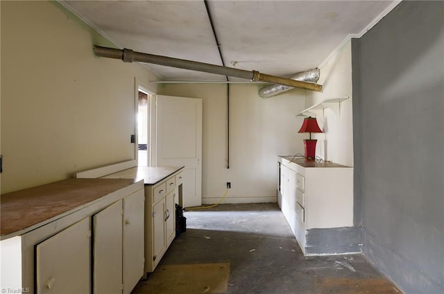 interior space featuring concrete floors