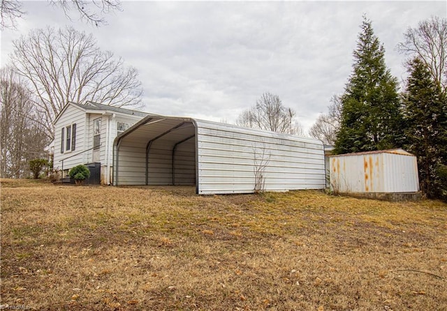 view of outbuilding featuring a carport