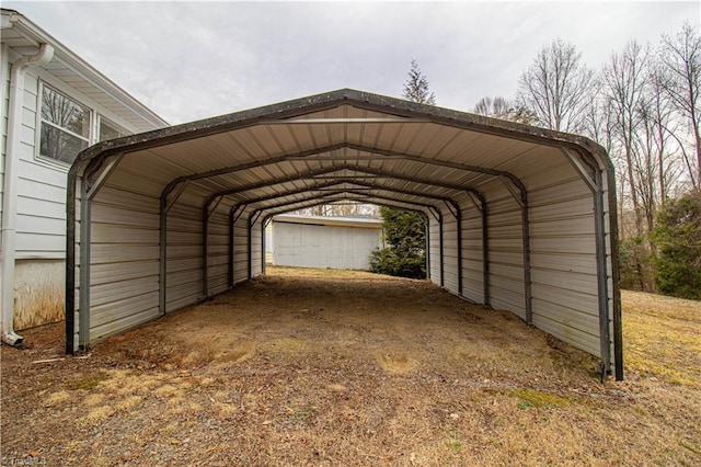 view of parking / parking lot with a carport