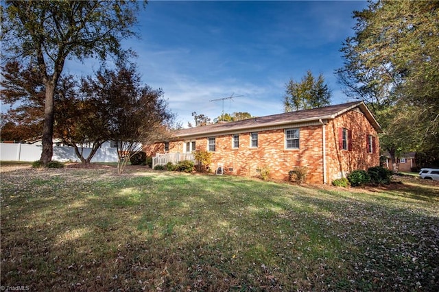 view of front of home with a front yard