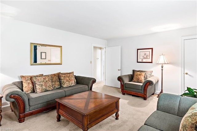 living room featuring light carpet