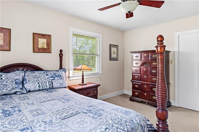 bedroom featuring ceiling fan, baseboards, and carpet flooring