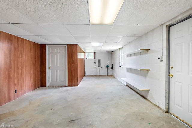 below grade area featuring wooden walls
