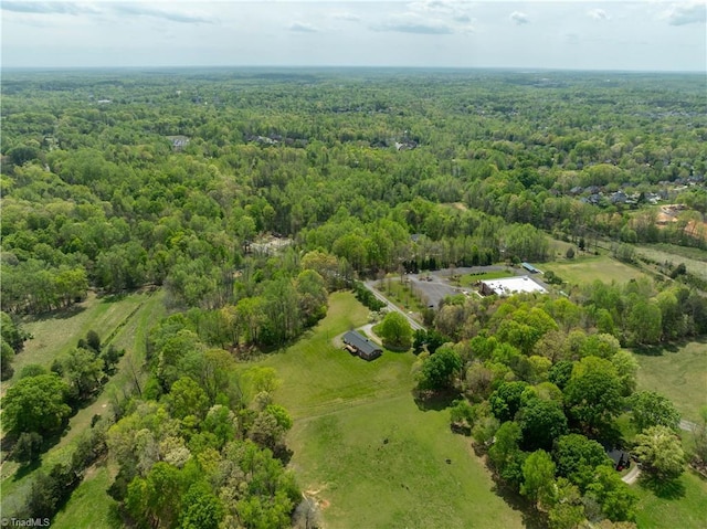 aerial view featuring a view of trees