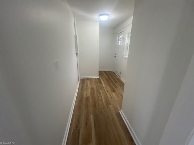 hall with light wood-type flooring