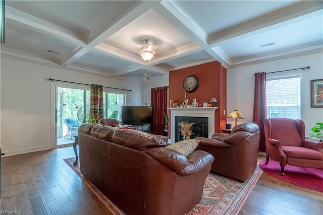 living room with hardwood / wood-style floors, beamed ceiling, coffered ceiling, and a fireplace