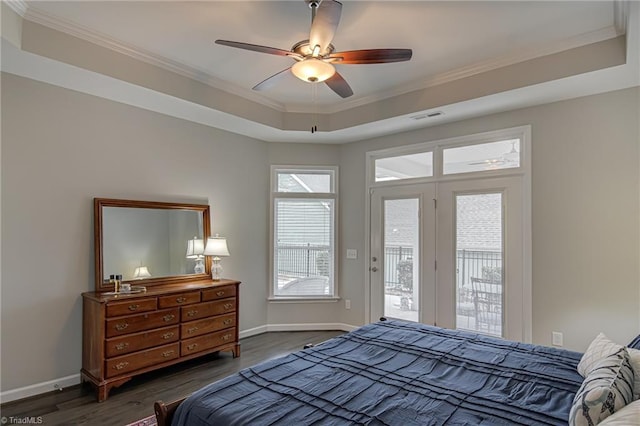 bedroom with access to exterior, visible vents, crown molding, and dark wood-type flooring