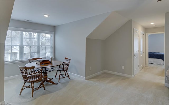 carpeted dining room featuring recessed lighting, visible vents, and baseboards