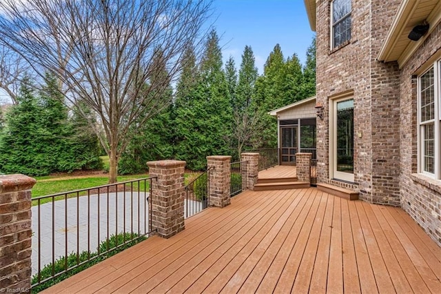 deck featuring a sunroom