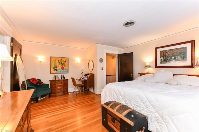 bedroom featuring light hardwood / wood-style flooring