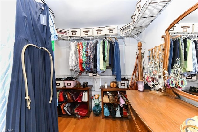 walk in closet featuring hardwood / wood-style flooring