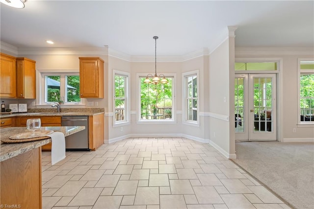 kitchen with dishwasher, baseboards, a sink, ornamental molding, and light stone counters