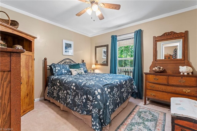 1044 Riverwood Rd, Lexington, NC 27292 - carpeted bedroom with ornamental molding, a ceiling fan, and baseboards