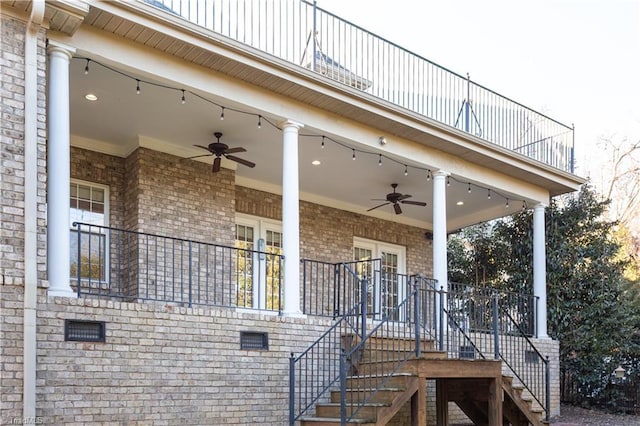 view of property exterior featuring a balcony, french doors, and ceiling fan