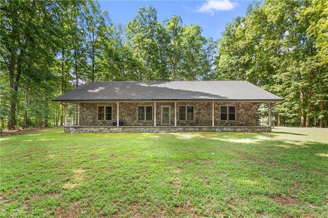 7849 Circle L Trl, Rougemont, NC 27572 - single story home with stone siding, a front yard, and a metal roof