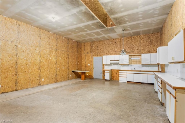 7849 Circle L Trl, Rougemont, NC 27572 - kitchen with white cabinetry, concrete flooring, and light countertops