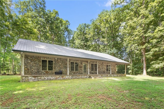 7849 Circle L Trl, Rougemont, NC 27572 - ranch-style house featuring stone siding, a front lawn, and a metal roof