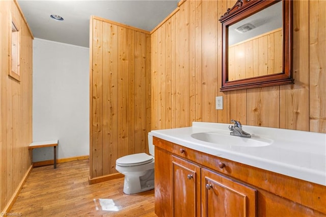 7849 Circle L Trl, Rougemont, NC 27572 - bathroom featuring vanity, wood finished floors, wood walls, and ornamental molding