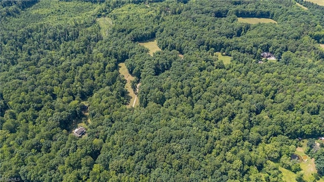 7849 Circle L Trl, Rougemont, NC 27572 - aerial view of property's location featuring a heavily wooded area
