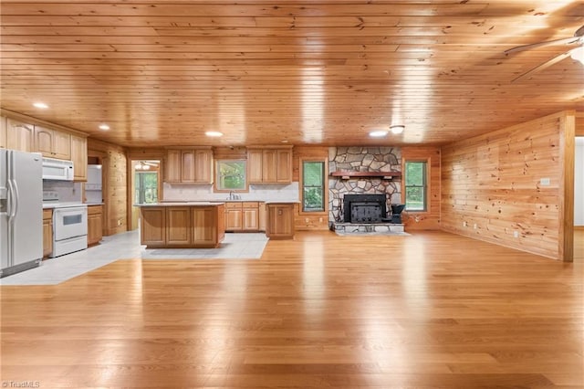 7849 Circle L Trl, Rougemont, NC 27572 - kitchen with white appliances, open floor plan, light wood-style flooring, wooden ceiling, and light countertops